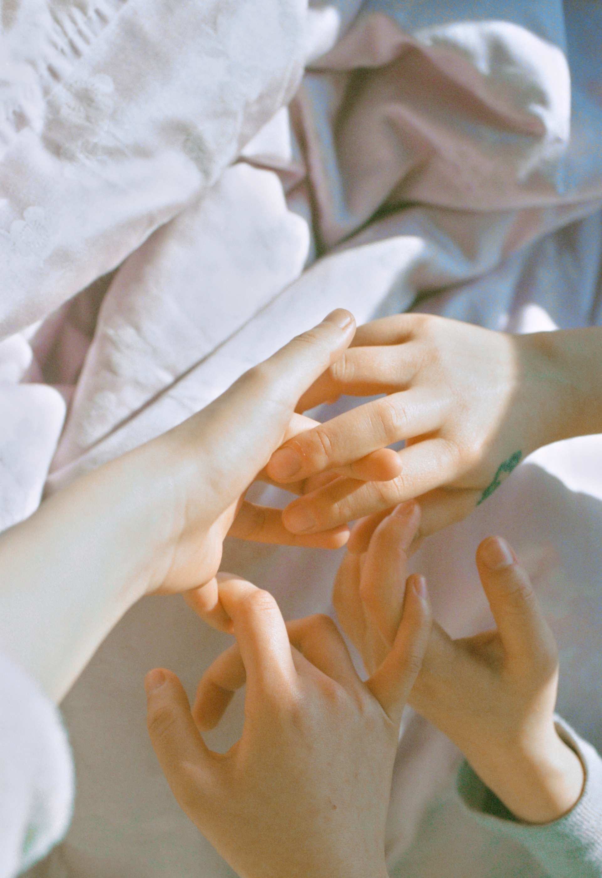 Hands held in soft light, suggesting careful financial guidance