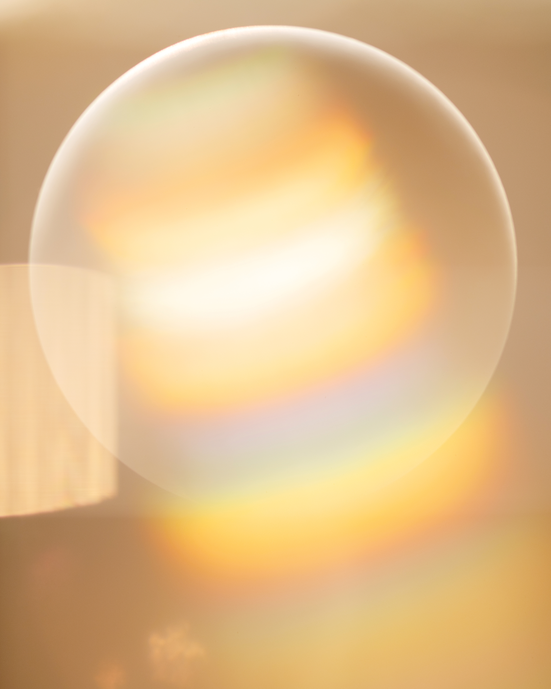 Luminous sphere catching warm light